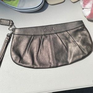 Coach chrome clutch